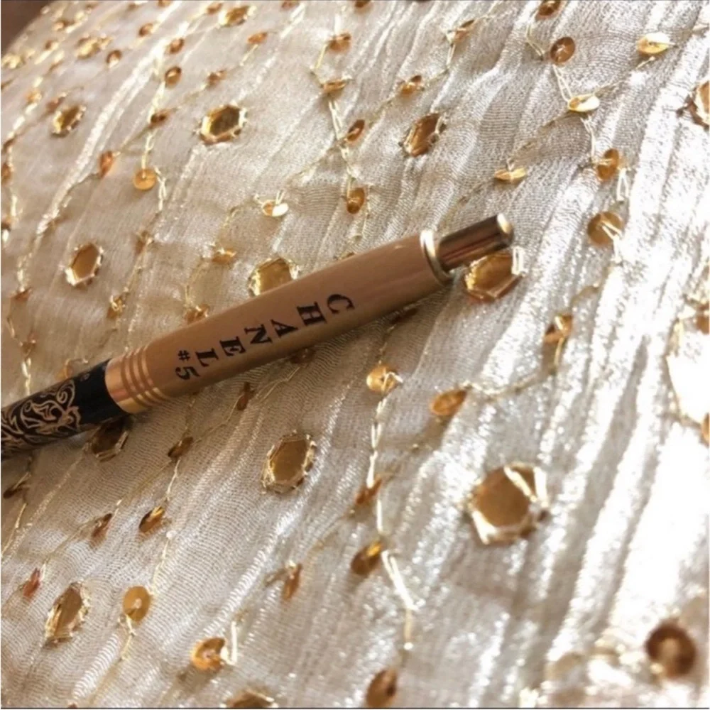 14K gold filigree pen.
